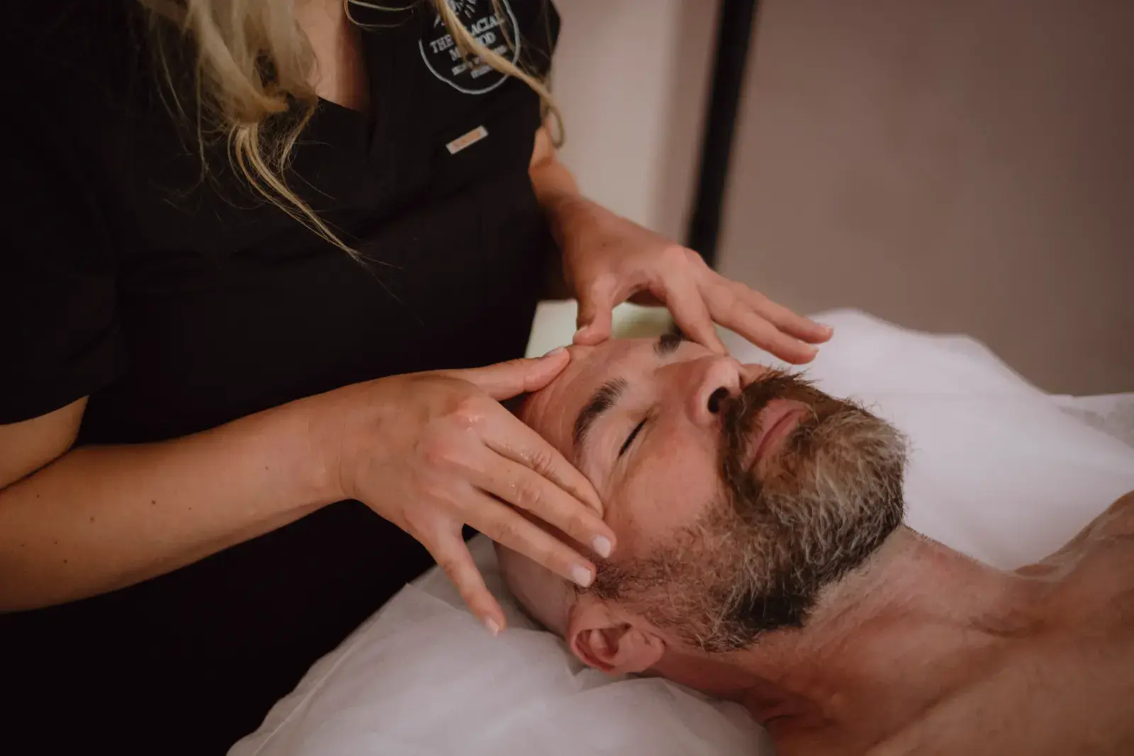 A pressure-point facial massage